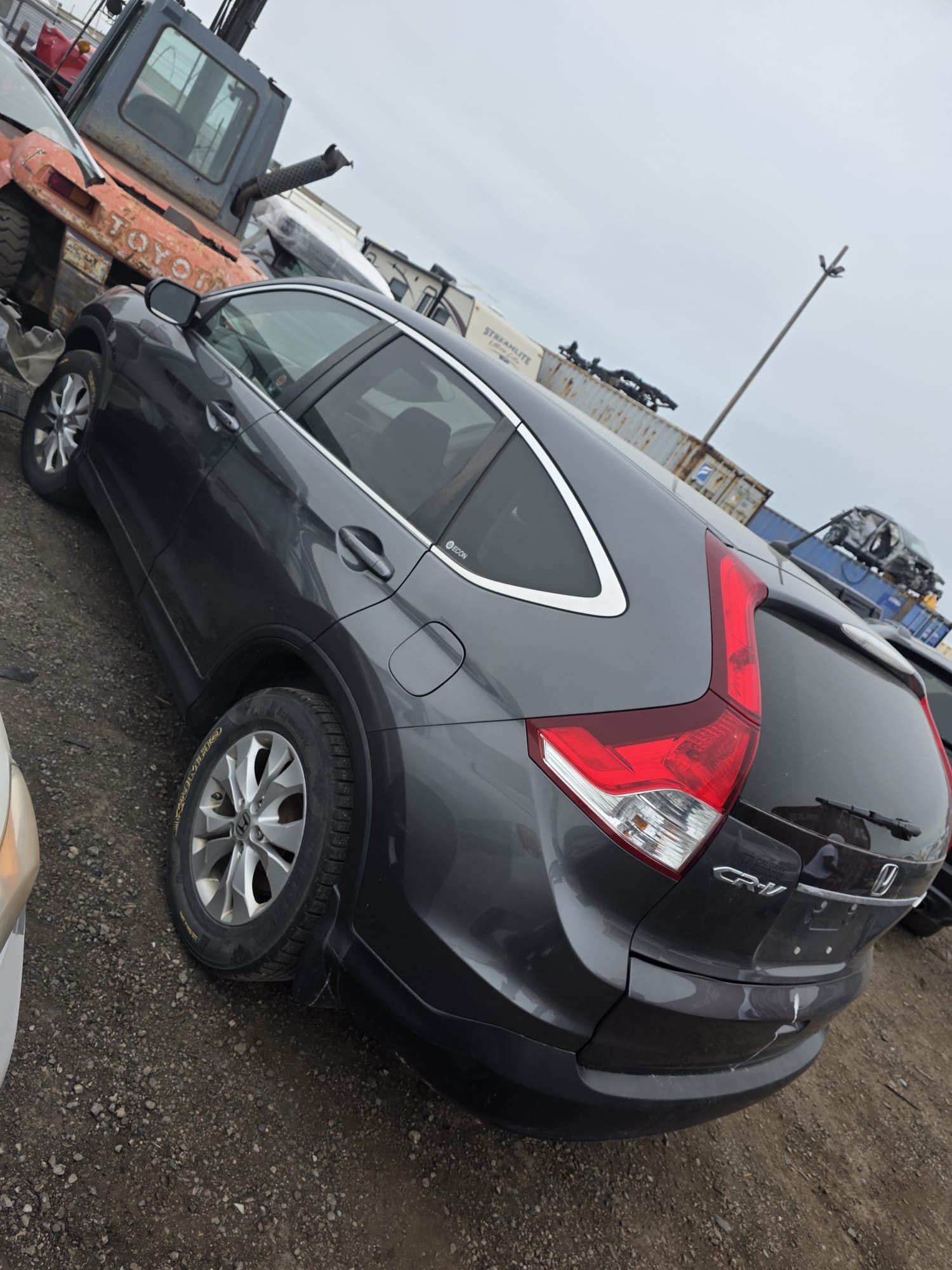 SUV secured inside the container for the crossing