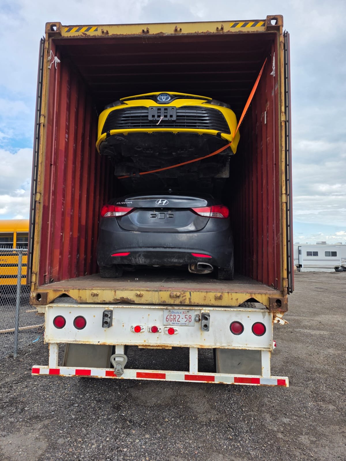 Sedan, pre-shipment yard inspection